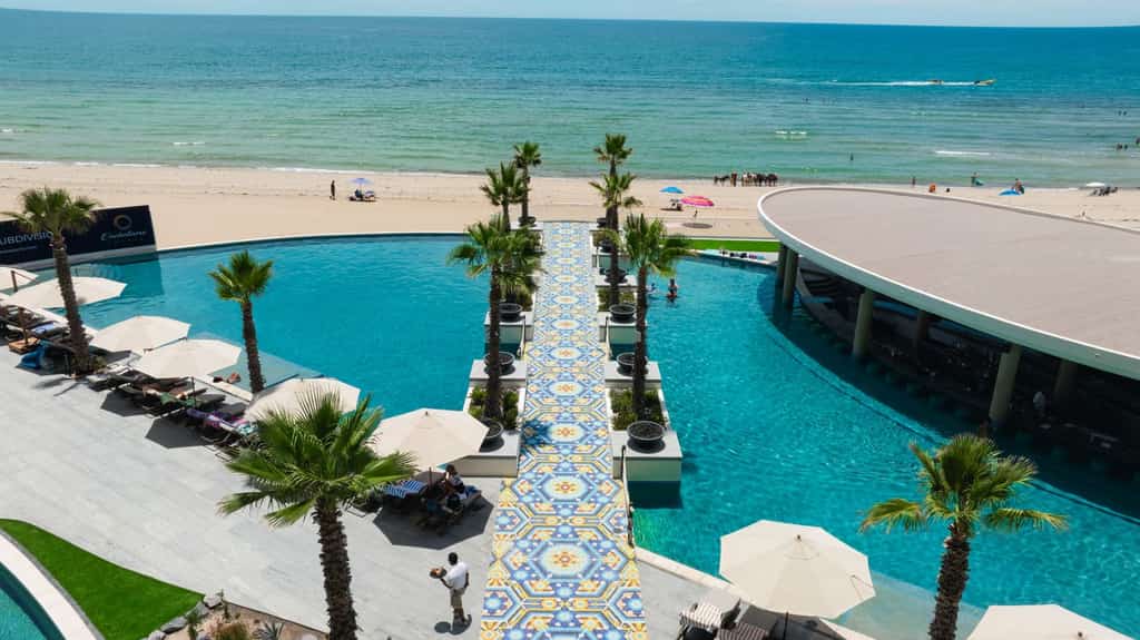Luxury Ground-Floor 3BR Retreat with Private Patio Steps from the Beach