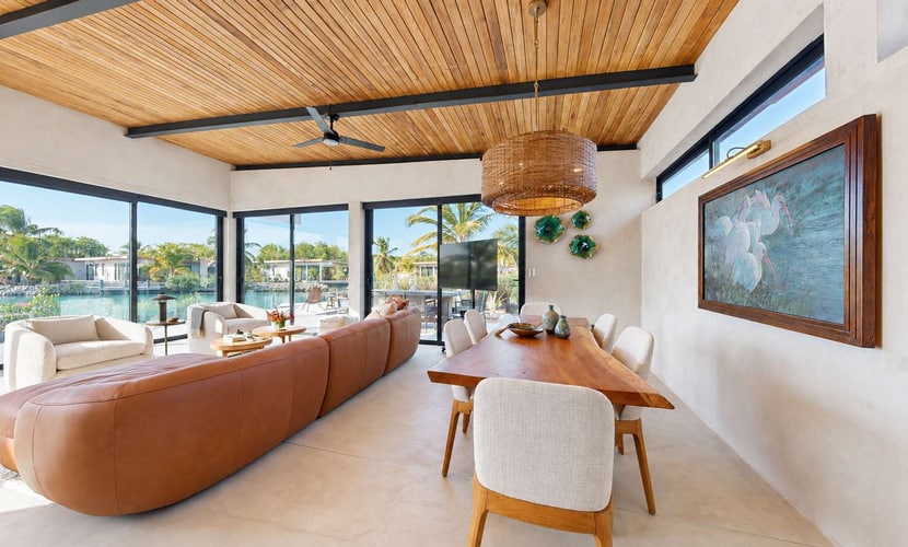 Stay lagoonfront at Seabird, an exclusive boutique community in Placencia. This three-bedroom villa for up to six guests features a private plunge pool and dock, inviting indoor-outdoor living, and access to Seabird's shared community pool and amenities.