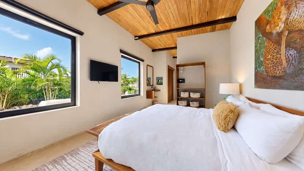 Stay lagoonfront at Seabird, an exclusive boutique community in Placencia. This three-bedroom villa for up to six guests features a private plunge pool and dock, inviting indoor-outdoor living, and access to Seabird's shared community pool and amenities.