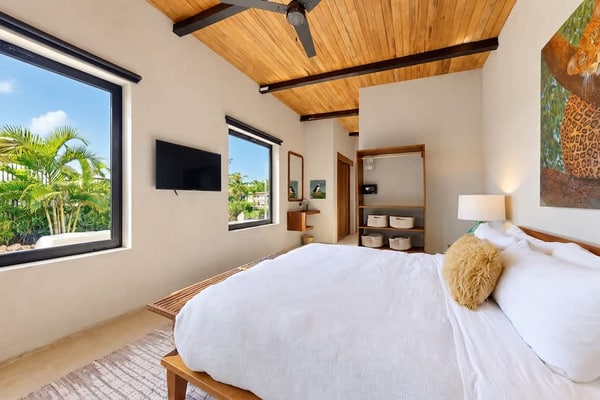Stay lagoonfront at Seabird, an exclusive boutique community in Placencia. This three-bedroom villa for up to six guests features a private plunge pool and dock, inviting indoor-outdoor living, and access to Seabird's shared community pool and amenities.