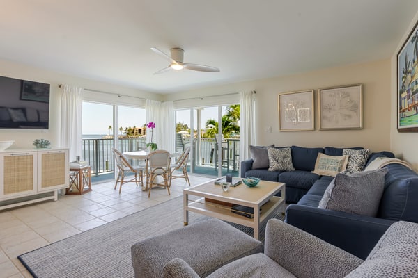 Oceanfront 3BR condo with water views, pool, and boat dock.
