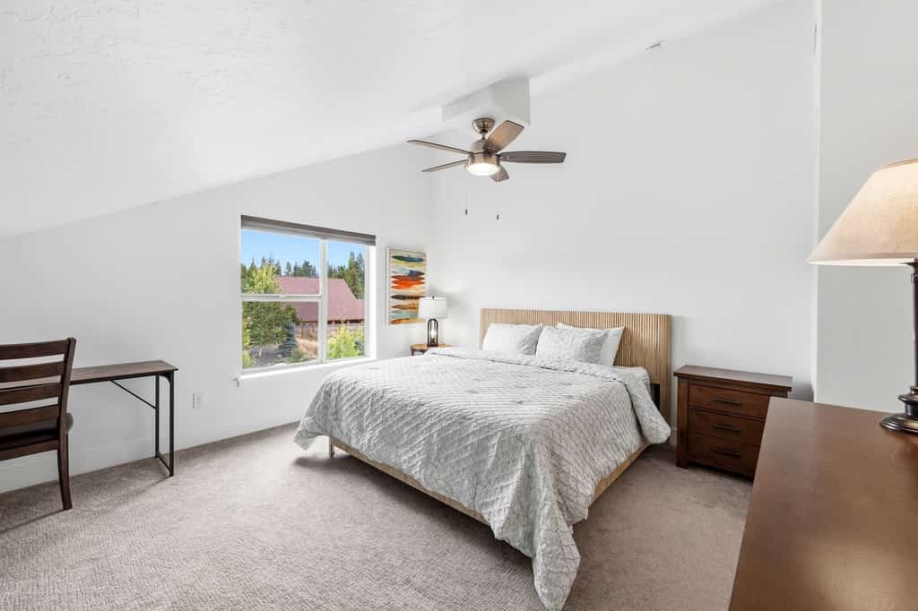 Welcome to Chateau Relaxeau, a modern three-bedroom, three-bathroom townhome in a newer McCall community just a short drive from downtown and Payette Lake. Spread across three levels, the home offers plenty of room and privacy for families, couples, or small groups, along with a private balcony, garage parking, and bright, comfortable spaces to relax after a day exploring McCall.