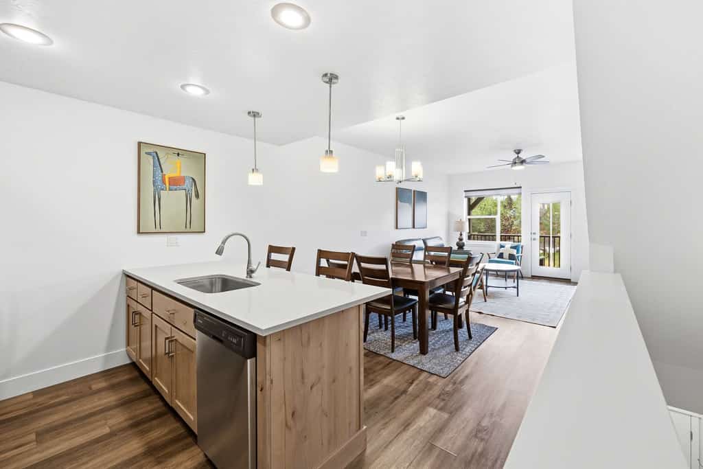 Welcome to Chateau Relaxeau, a modern three-bedroom, three-bathroom townhome in a newer McCall community just a short drive from downtown and Payette Lake. Spread across three levels, the home offers plenty of room and privacy for families, couples, or small groups, along with a private balcony, garage parking, and bright, comfortable spaces to relax after a day exploring McCall.