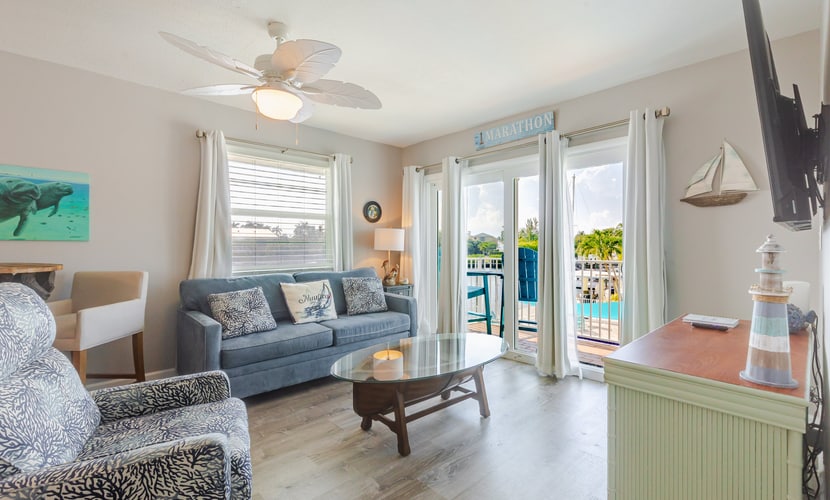 Canalfront condo with washer/dryer, boat dock and shared pool