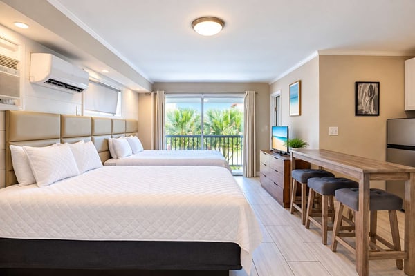 Welcome to Beach Bliss at 300 Tenth, a stylish coastal retreat designed for effortless relaxation in the heart of Myrtle Beach. Ideally situated just moments from the ocean, this inviting studio combines comfort, convenience, and coastal charm for a memorable seaside escape.
Thoughtfully appointed for a relaxing stay, the studio features comfortable bedding along with convenient essentials, including a mini fridge and microwave. The welcoming atmosphere provides the perfect place to enjoy a leisurely morning or unwind after a sun-filled day along the Grand Strand.
Spend your days soaking up the Carolina sunshine, relaxing by the resortâs outdoor swimming pool, or heading to the nearby beach for sand, surf, and refreshing ocean breezes. When youâre ready to explore, Myrtle Beachâs renowned dining, shopping, golf, entertainment, and attractions are all within easy reach.
Whether youâre planning a romantic coastal retreat, a relaxing beach vacation, or a getaway filled with Myrtle Beach adventures, Beach Bliss at 300 Tenth offers an elevated home base for enjoying everything the coast has to offer.