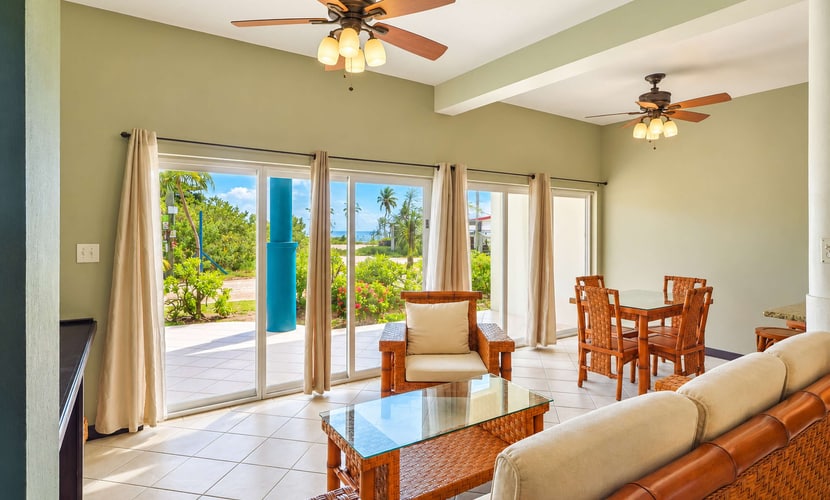 Enjoy sea views and fresh island breezes from this ground-floor condo at Mara Laguna in San Pedro, Belize, with a private patio and access to a shared outdoor pool. A king bedroom, fully equipped kitchen, air conditioning throughout, and a step-free layout make it a comfortable retreat for couples or small families.