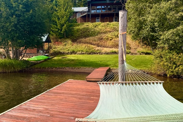 Wake up steps from Lake Coeur d'Alene, grab a kayak, and paddle into your day. Cottonwood Cottage is a 3-bedroom, 1.5-bathroom home on Cottonwood Bay—the quieter, slower side of the lake where you get direct water access without the downtown crowds. Sleep six comfortably, park your boat trailer, and make this your lake-lover's home base.