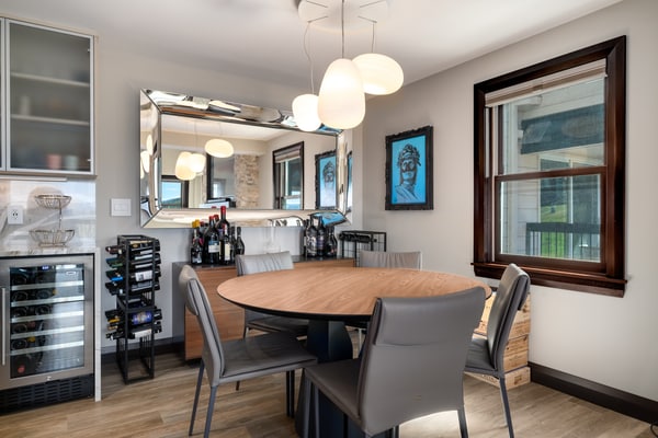 Spacious ski-in/out slopeside condo w/pool, four hot tubs, & grills