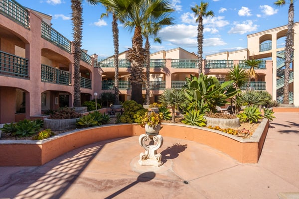 Beachfront 3BR, 2BA Pier 111 with pool, hot tub, gym, and ocean views.