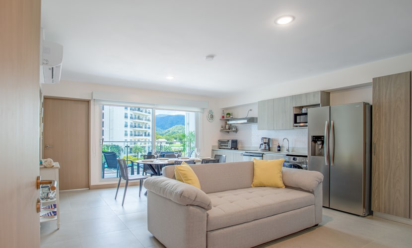 Welcome to your stylish coastal escape! This modern condo, just 3 minutes from vibrant Jaco, blends contemporary comfort with beach-inspired charm. Featuring sleek furnishings and marine-themed decor, the open-concept living area boasts expansive windows that frame stunning resort views.
The fully equipped kitchen includes high-end appliances and chic countertops, ideal for preparing meals. The adjacent dining and living spaces are perfect for relaxing or entertaining. Each luxurious bedroom offers plush bedding and serene views of the resort, ensuring a restful stay.
Step onto your private balcony to enjoy morning coffee or evening drinks with breathtaking sunsets. The complex includes exceptional amenities: three sparkling pools, a BBQ area, a state-of-the-art gym, and a versatile meeting room.
With Jaco’s vibrant nightlife, trendy shops, and dining options just a short drive away, this condo offers the ideal mix of relaxation and convenience. Book now to experience modern elegance, spectacular views, and unmatched comfort in your perfect beachfront retreat.