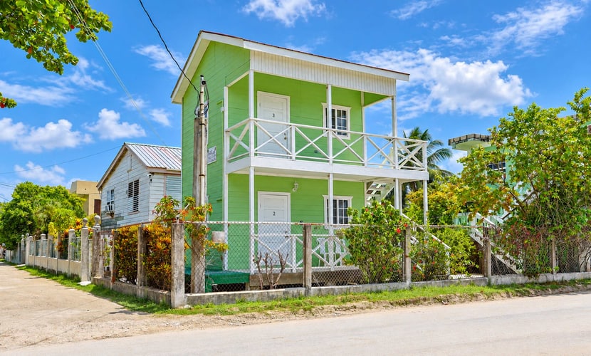 Experience the authentic "Go Slow" lifestyle at Raul's Apartments Unit 2 in Caye Caulker. Ideally situated along one of the island's main streets close to everything, this cozy apartment is an ideal getaway for solo travelers or couples featuring split-unit AC, high-speed Wi-Fi, kitchenette, and a front porch perfect for morning coffee and relaxation.