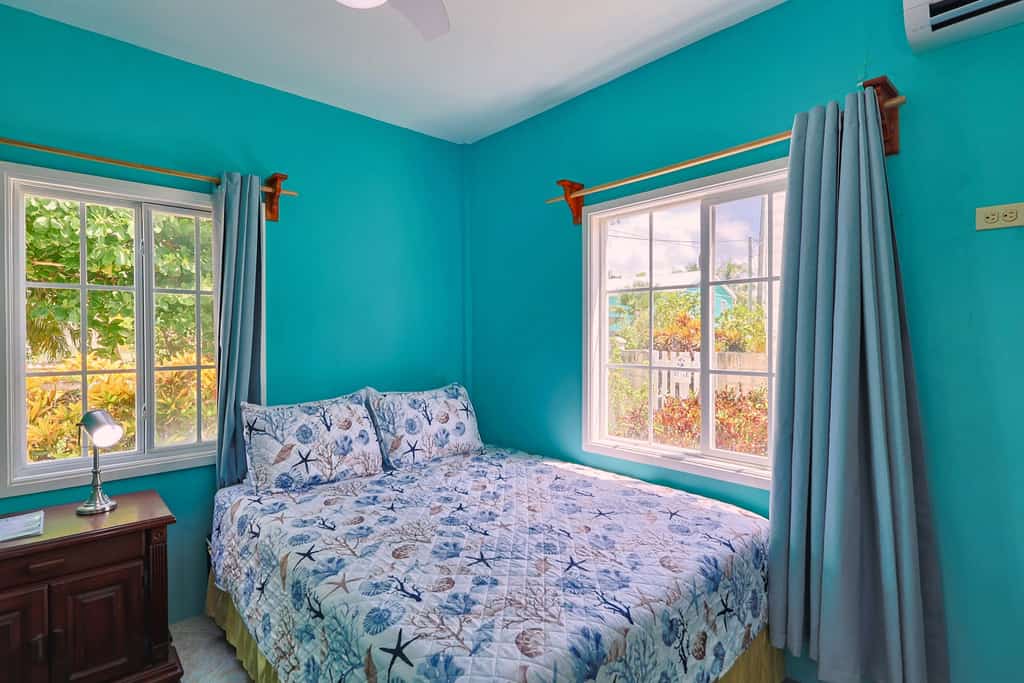 Experience the authentic "Go Slow" lifestyle at Raul's Apartments Unit 2 in Caye Caulker. Ideally situated along one of the island's main streets close to everything, this cozy apartment is an ideal getaway for solo travelers or couples featuring split-unit AC, high-speed Wi-Fi, kitchenette, and a front porch perfect for morning coffee and relaxation.