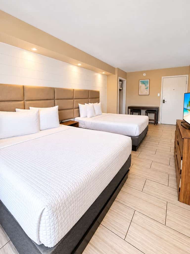 Escape to the coast and enjoy a relaxing Myrtle Beach getaway at 300 Tenth, Unit 225. Ideally located just moments from the ocean, this inviting studio offers the perfect blend of comfort and convenience for your beach vacation.

Featuring two comfortable queen beds, the space is ideal for couples, families, or small groups looking to stay close to the best of Myrtle Beach. A convenient kitchenette makes it easy to keep your favorite drinks and snacks on hand or prepare a quick bite between adventures.

Spend sunny days relaxing by the resort’s outdoor swimming pool or head to the nearby beach for sand, surf, and ocean breezes. When it’s time to unwind, return to your private studio and recharge in comfort.

With a fantastic coastal location, resort-style amenities, and everything you need for an easygoing stay, Unit 225 is a welcoming home base for your Myrtle Beach escape.