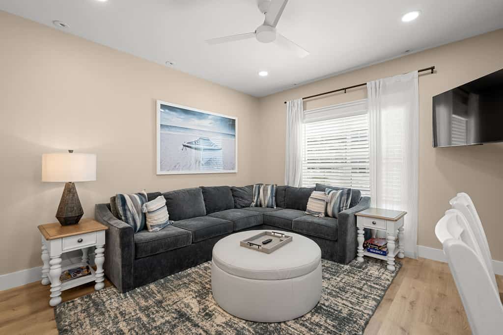 Escape to paradise where there is plenty of space for family and friends in this three-story townhome in The Homes at Olive Shell. The 4-bedroom home sleeps up to 10 guests and features two king bedrooms, two queen bedrooms, a private plunge pool, multiple screened porches, a spacious garage with golf simulator and arcade, and access to community amenities including a resort-style pool, walking trails, cornhole, and foosball. Enjoy easy access to North End dining, golf, fishing, and island attractions.