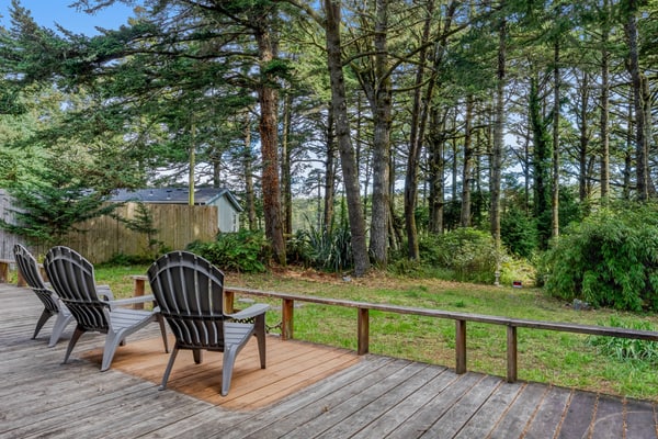 Lakefront Retreat Steps from the Water with Decks & Peaceful Wooded Backyard