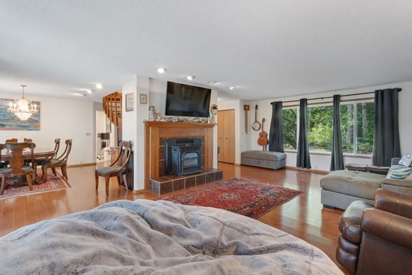 Lakefront Retreat Steps from the Water with Decks & Peaceful Wooded Backyard