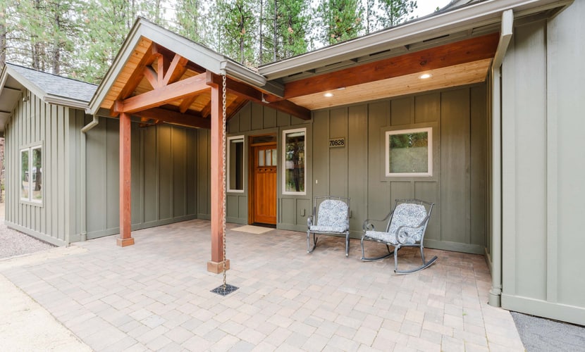 Stunning modern mountain home with gourmet kitchen, a cozy fireplace, and a private outdoor patio with a hot tub and fire pit. Explore resort-style amenities, including golf, swimming, tennis, and scenic biking.