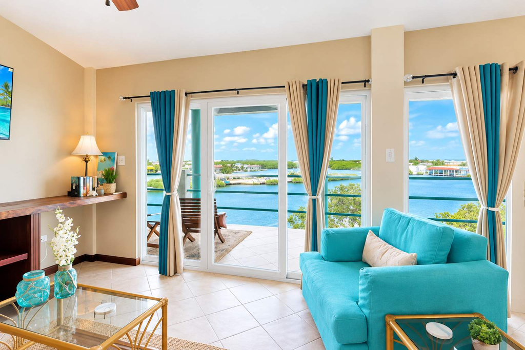 Renovated Lagoon View Condo with Pool in San Pedro