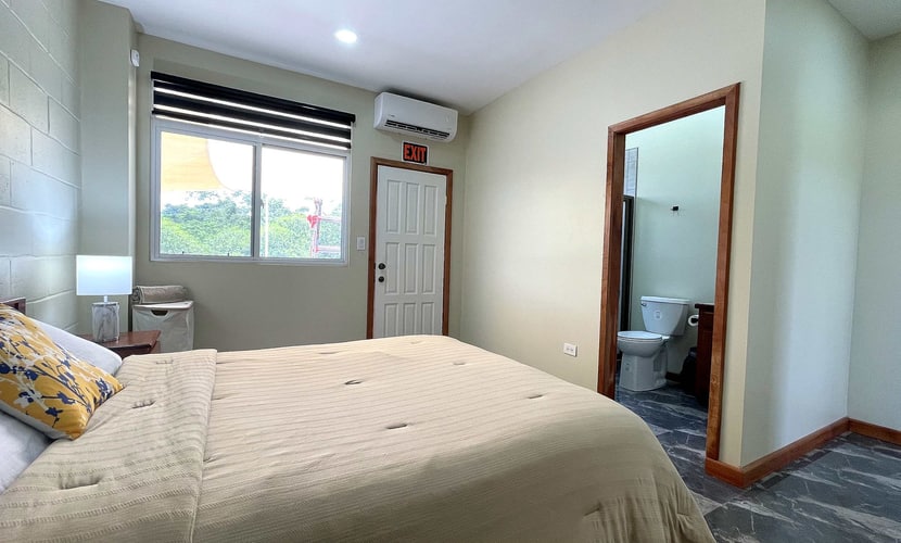 Stay in comfort in this brand-new, modern 2-bedroom, 2-bathroom apartment at Crown Heights in San Ignacio, Cayo District, Belize. It’s bright, airy and spacious, with air-conditioned bedrooms, a fully equipped kitchen and parking, and it sleeps 4. You’re close to town, Maya ruins, caves, rivers and jungle adventures, so it makes an easy base for exploring western Belize.