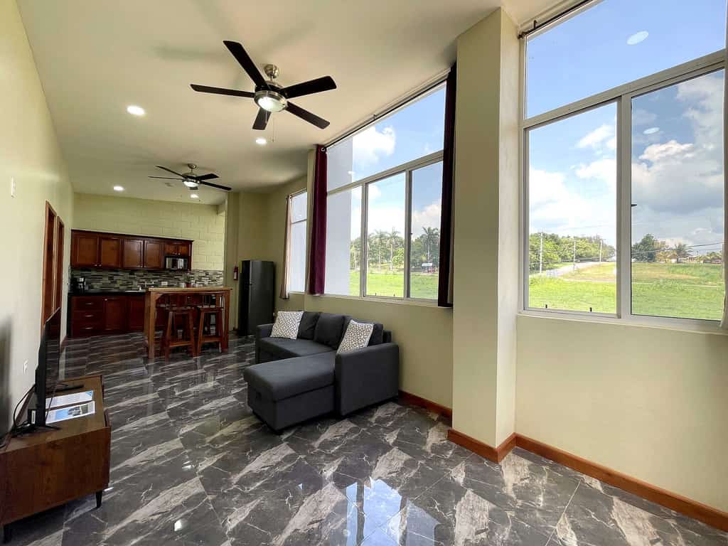 Stay in comfort in this brand-new, modern 2-bedroom, 2-bathroom apartment at Crown Heights in San Ignacio, Cayo District, Belize. It’s bright, airy and spacious, with air-conditioned bedrooms, a fully equipped kitchen and parking, and it sleeps 4. You’re close to town, Maya ruins, caves, rivers and jungle adventures, so it makes an easy base for exploring western Belize.