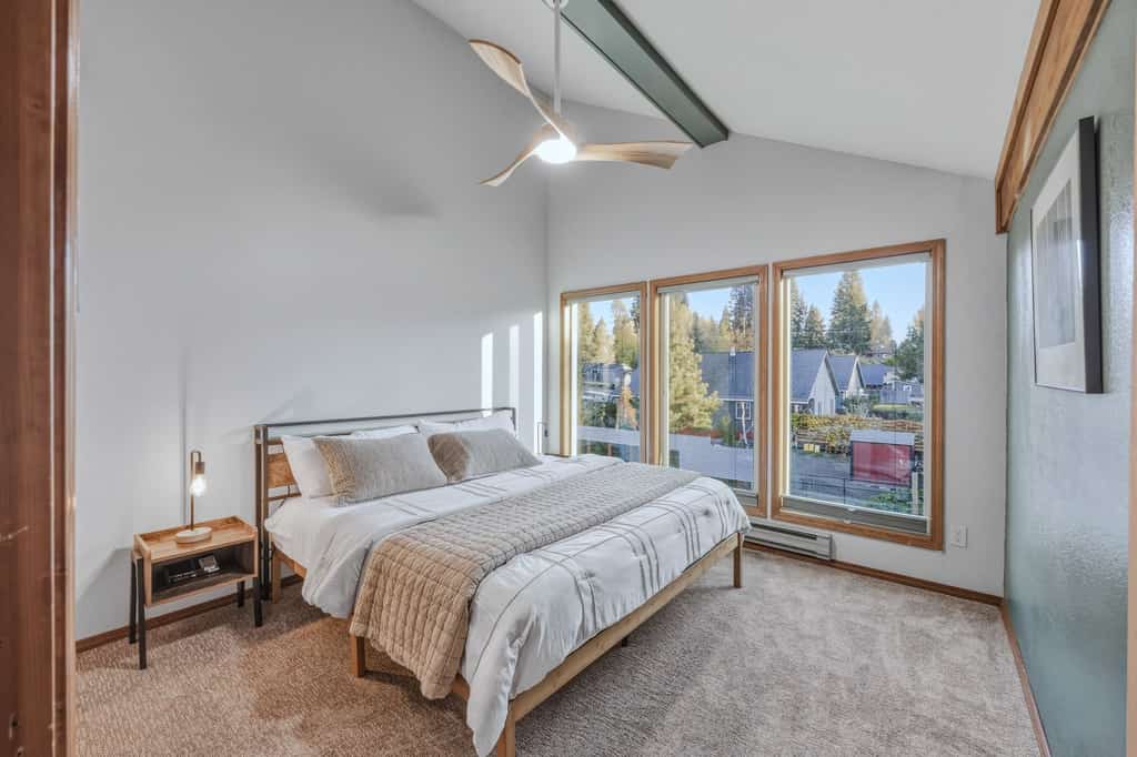 Enjoy a relaxing McCall getaway at this bright, two-bedroom, two-bathroom condo in Aspen Village. With vaulted ceilings, large windows, a king suite, air conditioning, and access to community pools, hot tubs, and recreational amenities, this two-level retreat comfortably accommodates up to six guests. Located near Payette Lake, Ponderosa State Park, and downtown McCall, it's a convenient home base for year-round adventures.