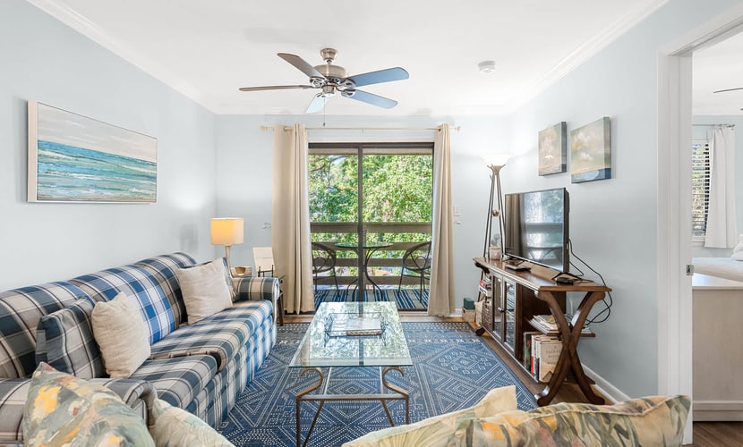 Enjoy a relaxing Hilton Head Island getaway in this top-floor, two-bedroom, two-bathroom condo in Fiddlers Cove. Located just 0.3 miles from Folly Field Beach Park, this comfortable retreat features a fully equipped kitchen, free WiFi, cable TV, and sleeping space for up to six guests with a queen bed, two twin beds, and a sleeper sofa. Enjoy seasonal access to one heated and one unheated community pool, plus resort amenities and nearby island attractions.