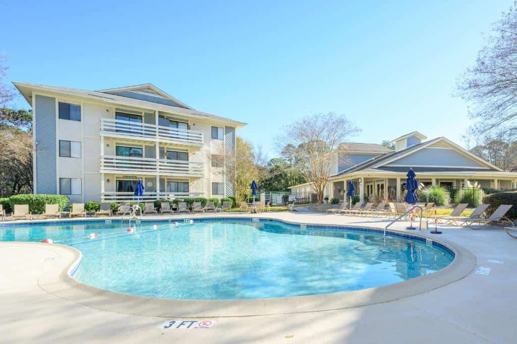 Enjoy a relaxing Hilton Head Island getaway in this top-floor, two-bedroom, two-bathroom condo in Fiddlers Cove. Located just 0.3 miles from Folly Field Beach Park, this comfortable retreat features a fully equipped kitchen, free WiFi, cable TV, and sleeping space for up to six guests with a queen bed, two twin beds, and a sleeper sofa. Enjoy seasonal access to one heated and one unheated community pool, plus resort amenities and nearby island attractions.
