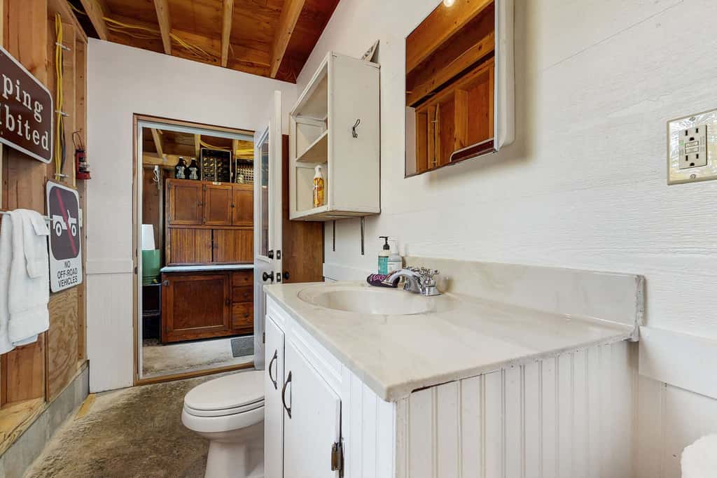 Lakefront retreat with 3 dwellings, fire pit, dock, kayaks, paddleboards & stunning Glen Lake views