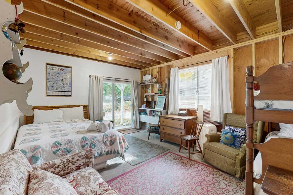 Lakefront retreat with 3 dwellings, fire pit, dock, kayaks, paddleboards & stunning Glen Lake views