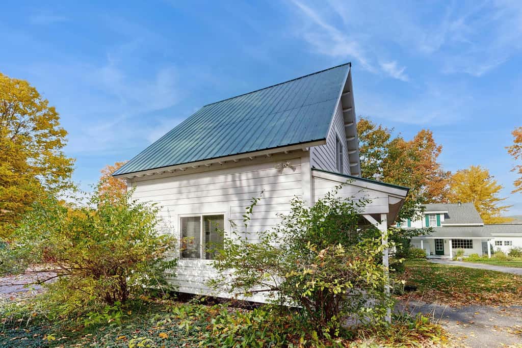 Lakefront retreat with 3 dwellings, fire pit, dock, kayaks, paddleboards & stunning Glen Lake views