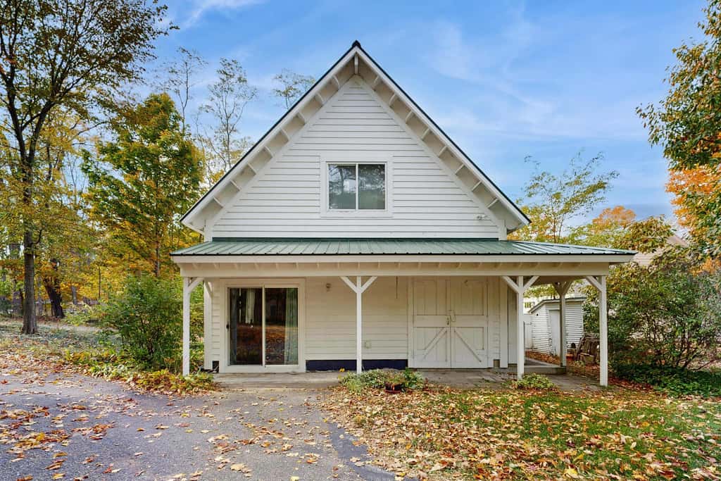 Lakefront retreat with 3 dwellings, fire pit, dock, kayaks, paddleboards & stunning Glen Lake views
