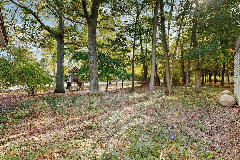 Lakefront retreat with 3 dwellings, fire pit, dock, kayaks, paddleboards & stunning Glen Lake views