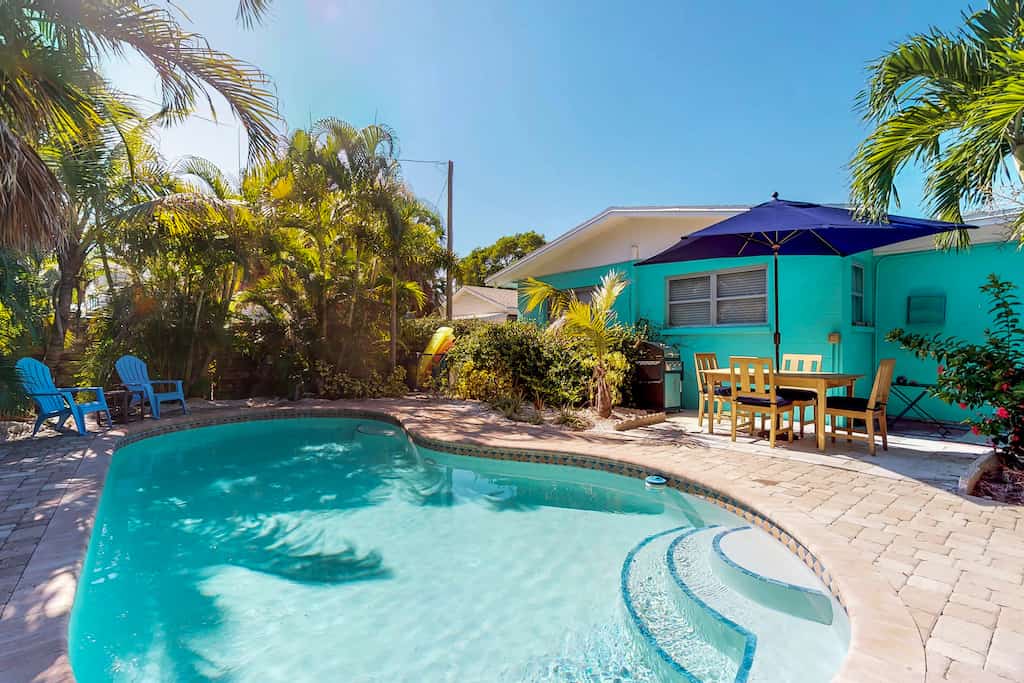 The pool area of a cottage rental in Anna Maria.