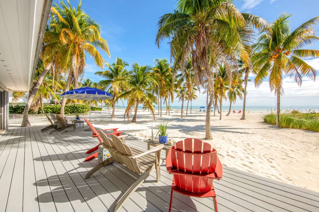 beach chairs on the sand in the florida keys