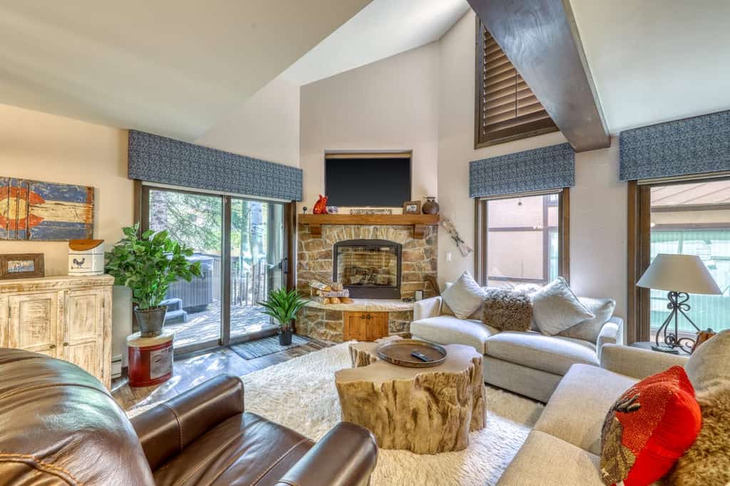 ski condo in Vail with wood burning fireplace and cozy furniture