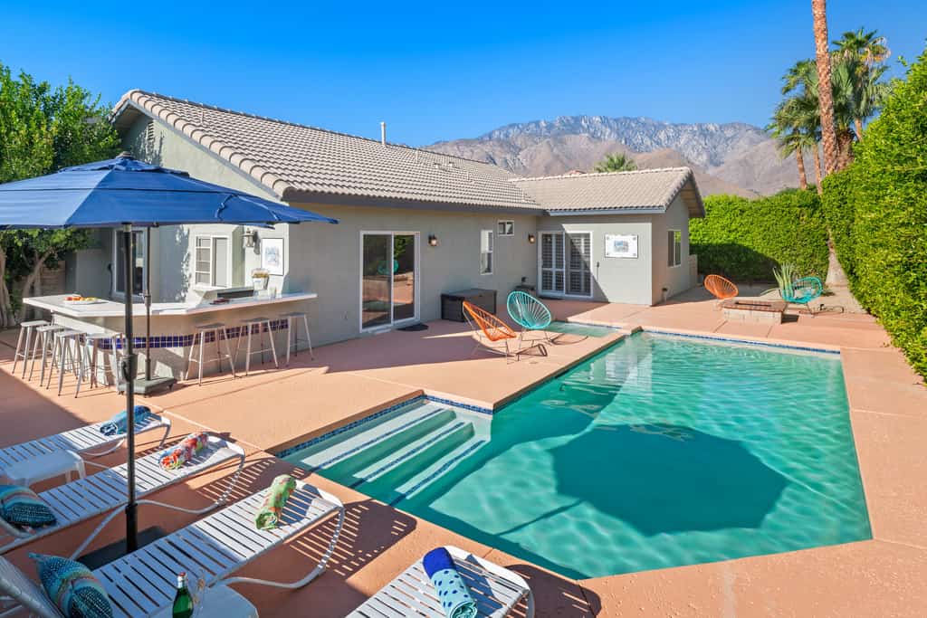 Palm Springs vacation home with outdoor pool and bar