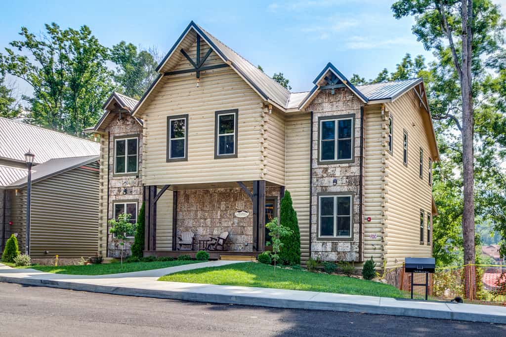 A large home with log cabin features and an elegant exterior that's a vacation rental in Gatlinburg, Tennessee.