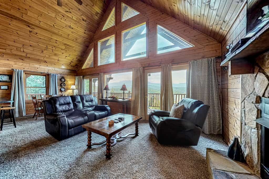The living room with high ceilings at a vacation rental in the Smoky Mountains.