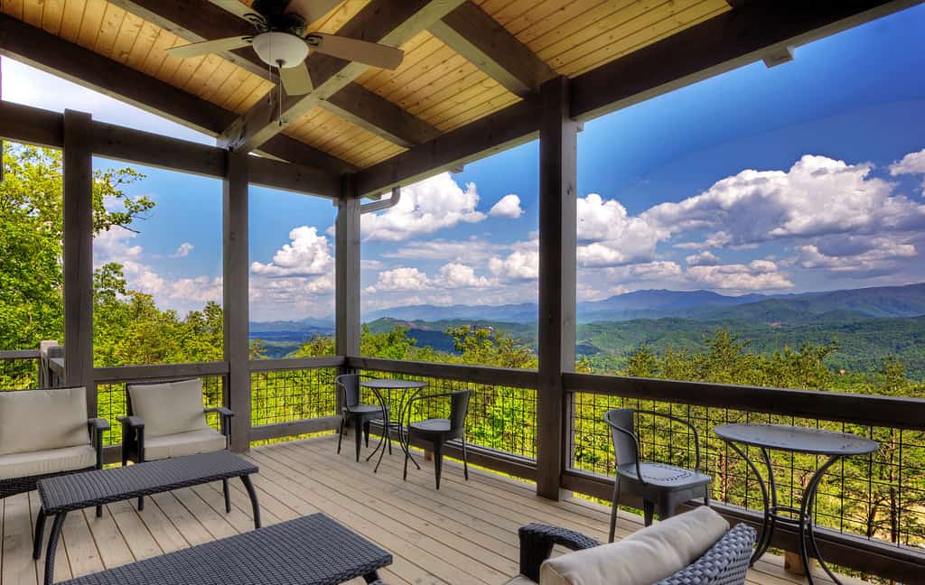 Outdoor deck with modern furniture and mountain views in Sevierville, TN