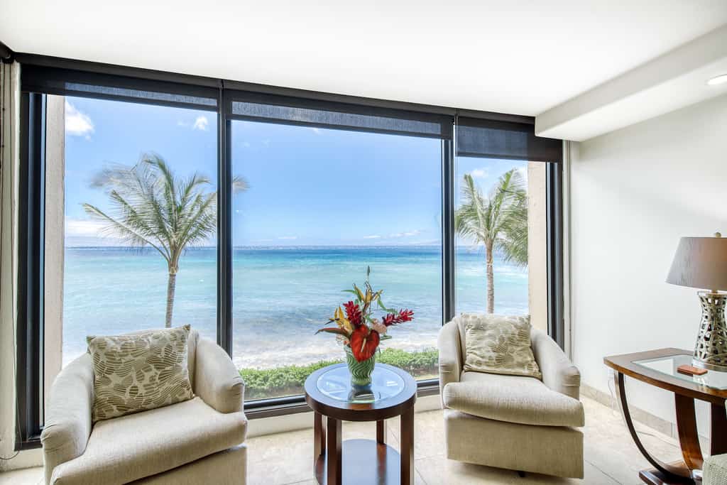 The living area overlooking the ocean at a vacation rental in Lahaina, HI.