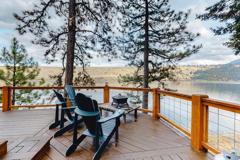 The view from the deck of a vacation rental in Joseph, OR overlooking the lake.