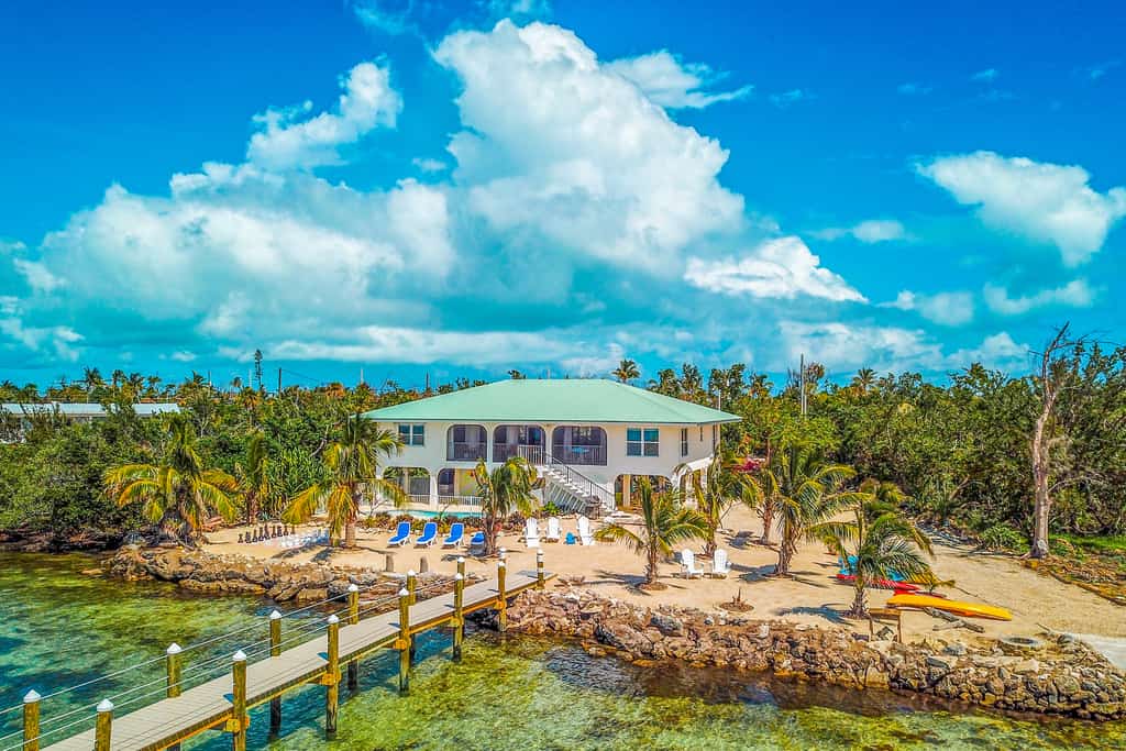 Vacation rental on the Gulf Coast with a dock and private beach.
