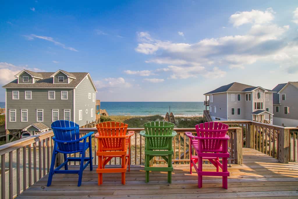 Best beach house amenities for vacation rentals: deck chairs.