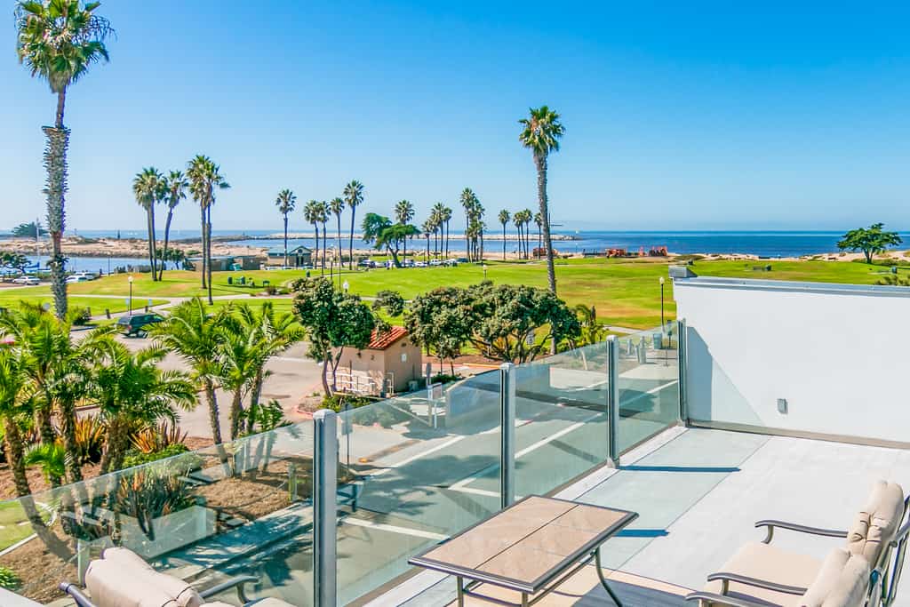 View from a balcony overlooking the beach in Ventura, CA.