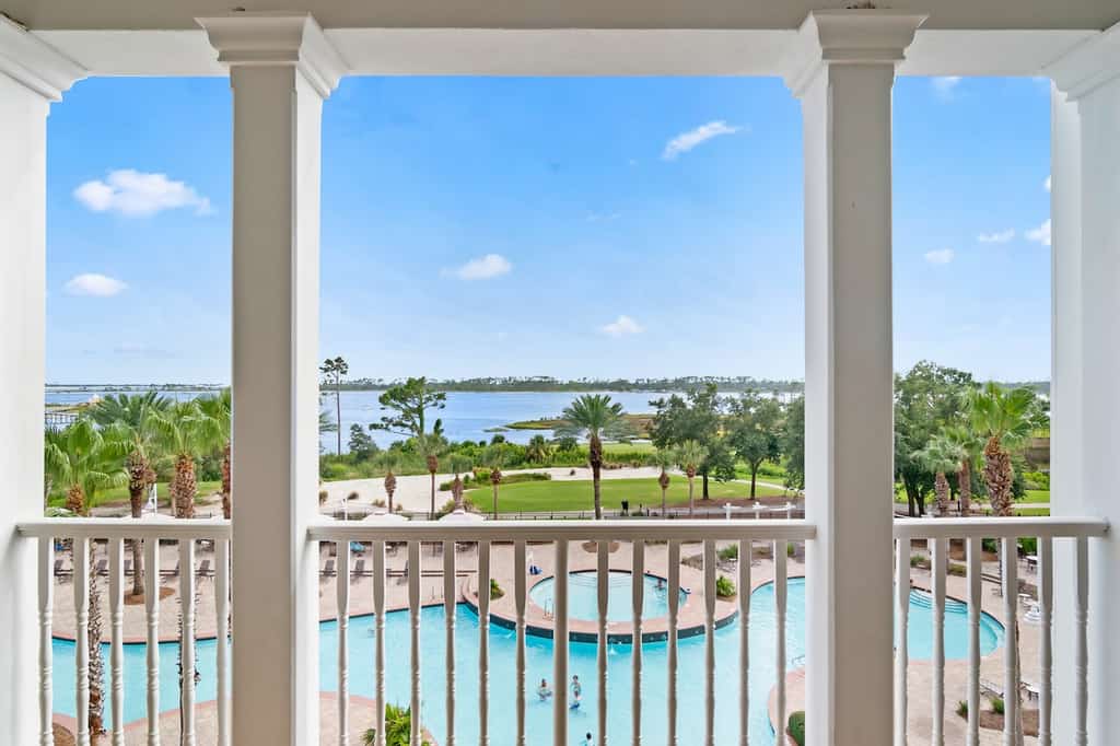 View of the pool as seen from the balcony at a condo rental at Reflections at Bay Pointe in Panama City Beach, FL.