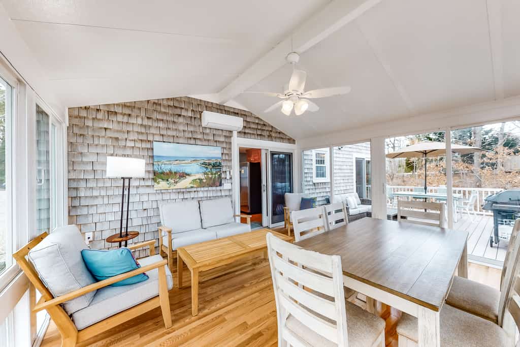The sun room of a vacation rental in Cape Cod, MA