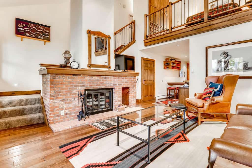 brick fireplace inside of Snowmass Village, CO vacation home