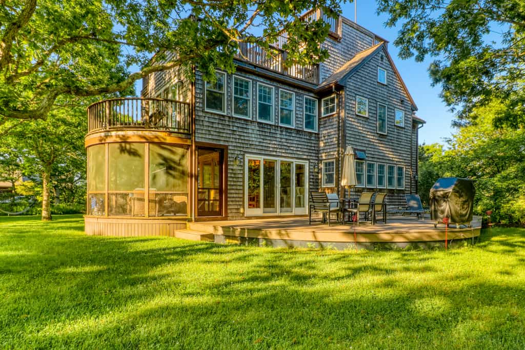 The exterior of a Martha's Vineyard vacation rental with a deck.