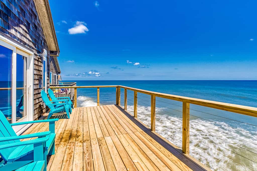 The deck overlooking the ocean at a vacation rental in the Outer Banks.