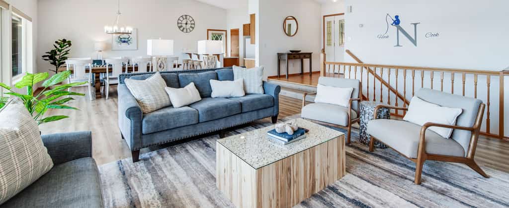 Inside a fully furnished and well-lit Brinnon, WA vacation rental living room.